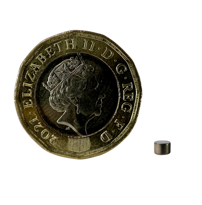 D3.0 x 2.0mm N35 Neodymium Magnet pictured with pound coin for scale.