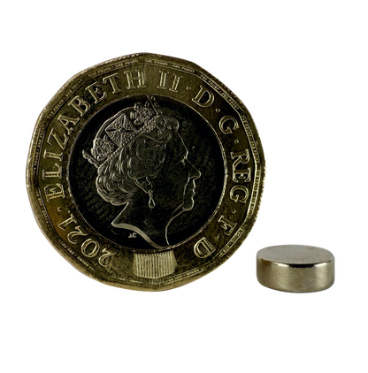 D8.0 x 3.0mm Neodymium disc magnets. Nickel Plated. Pack of 10. Shown with pound coin for scale.