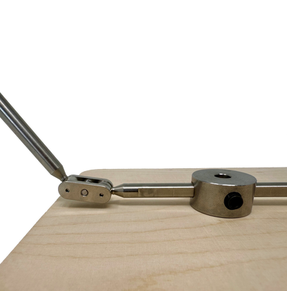 Stop motion animation rig with ball and socket joints, enabling suspended puppet poses for dynamic scene. 