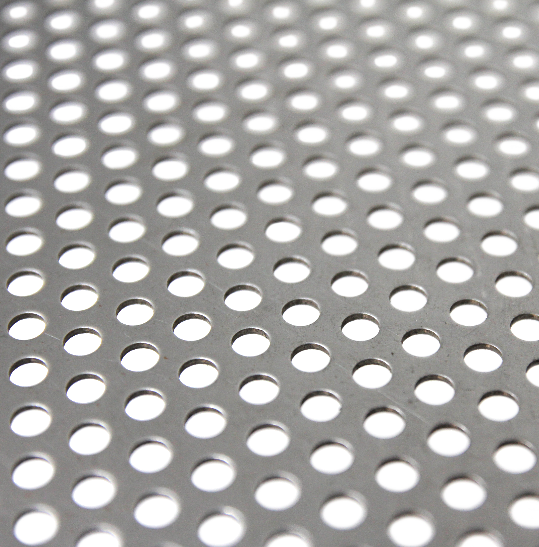Galvanised Steel Perforated Sheet. The holes are 5mm and the sheet 1.2mm thick.